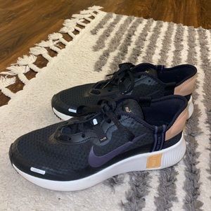 Women's Nike Reposto Black/Cave Purple-LT Cognac